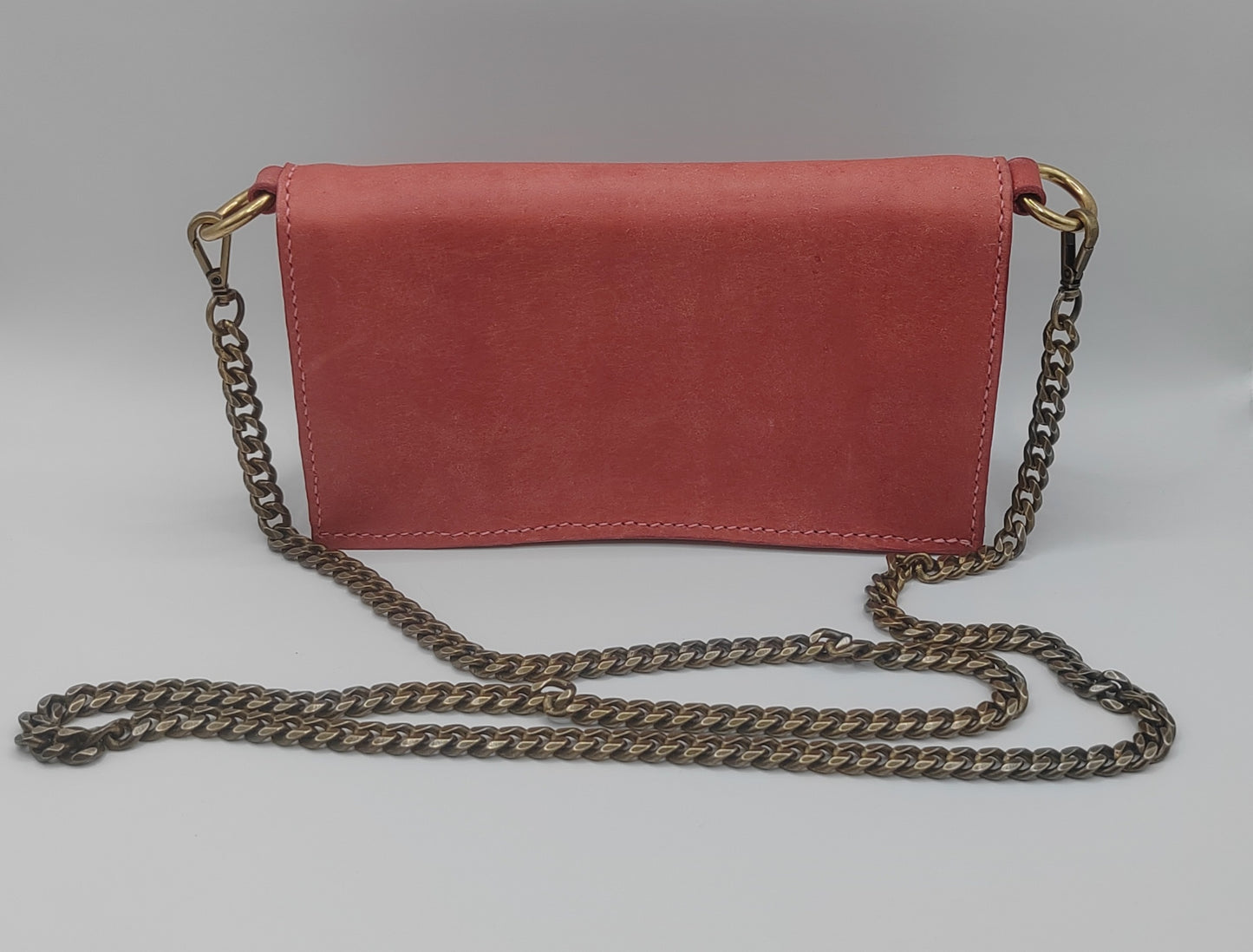 Sac portefeuille rose en cuir pour femme