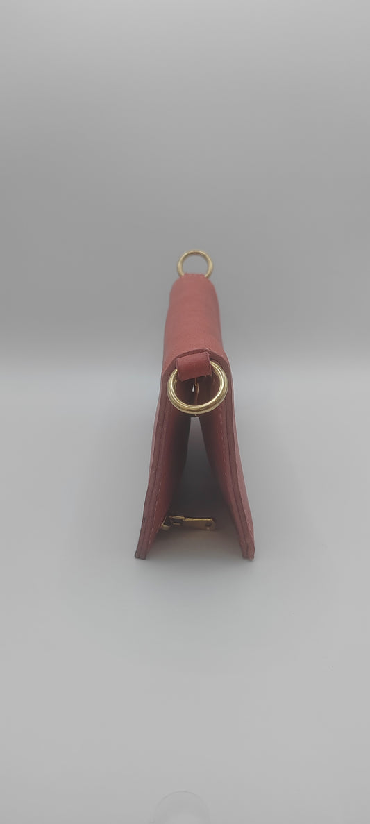 Le portefeuille rose velours en cuir Badalassi