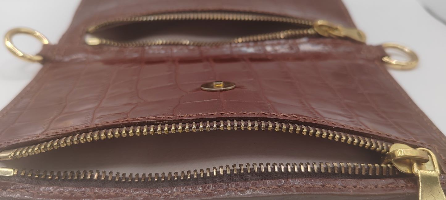 Le portefeuille cognac en cuir imprimé crocodile