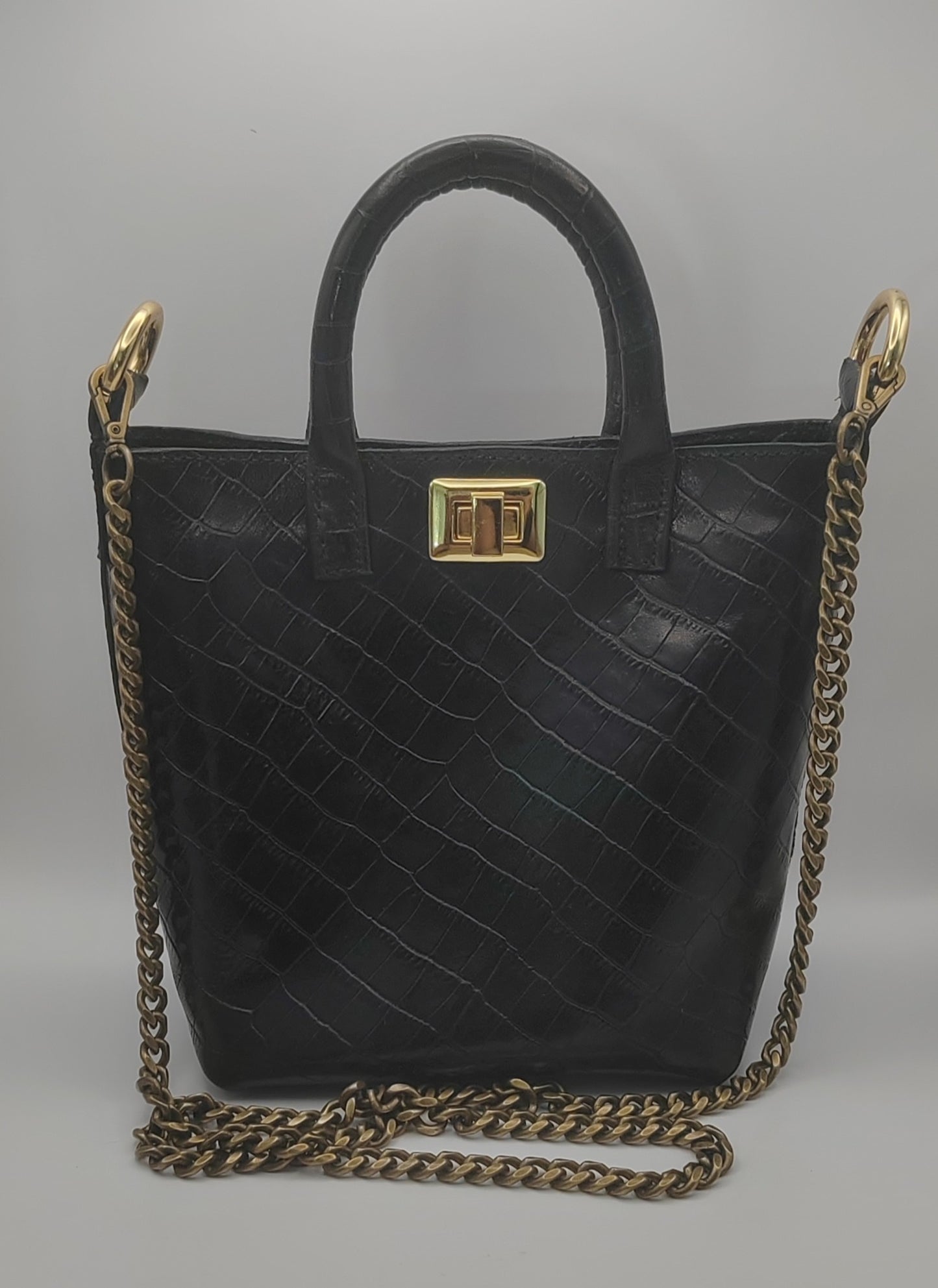 Le sac seau en cuir imprimé crocodile