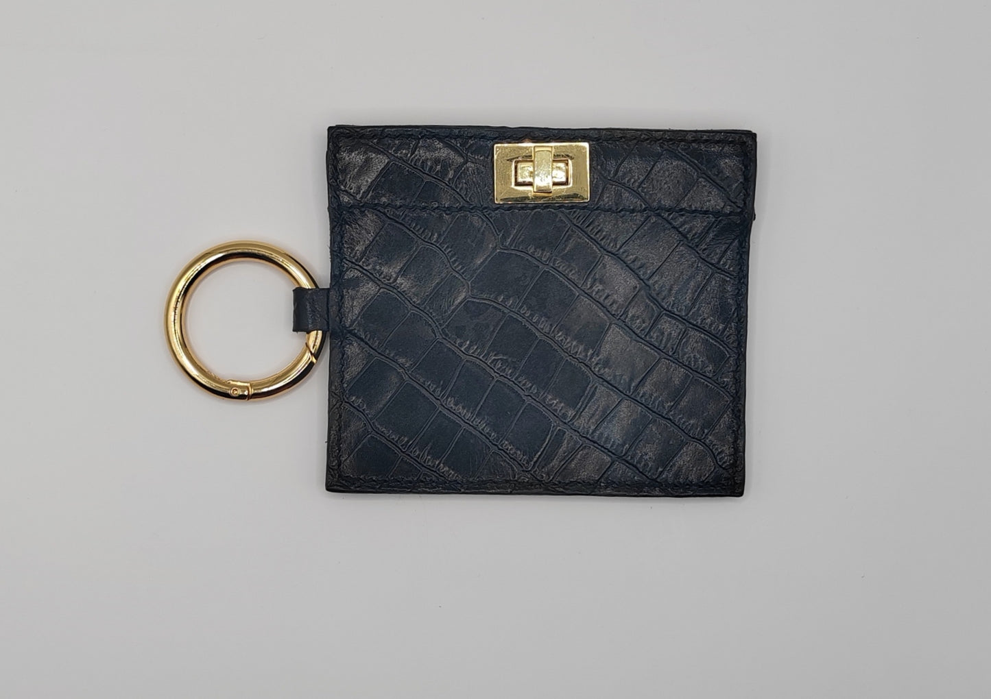 Le porte-cartes beige en cuir grainé souple