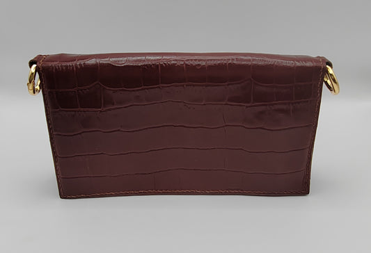 Le portefeuille cognac en cuir imprimé crocodile