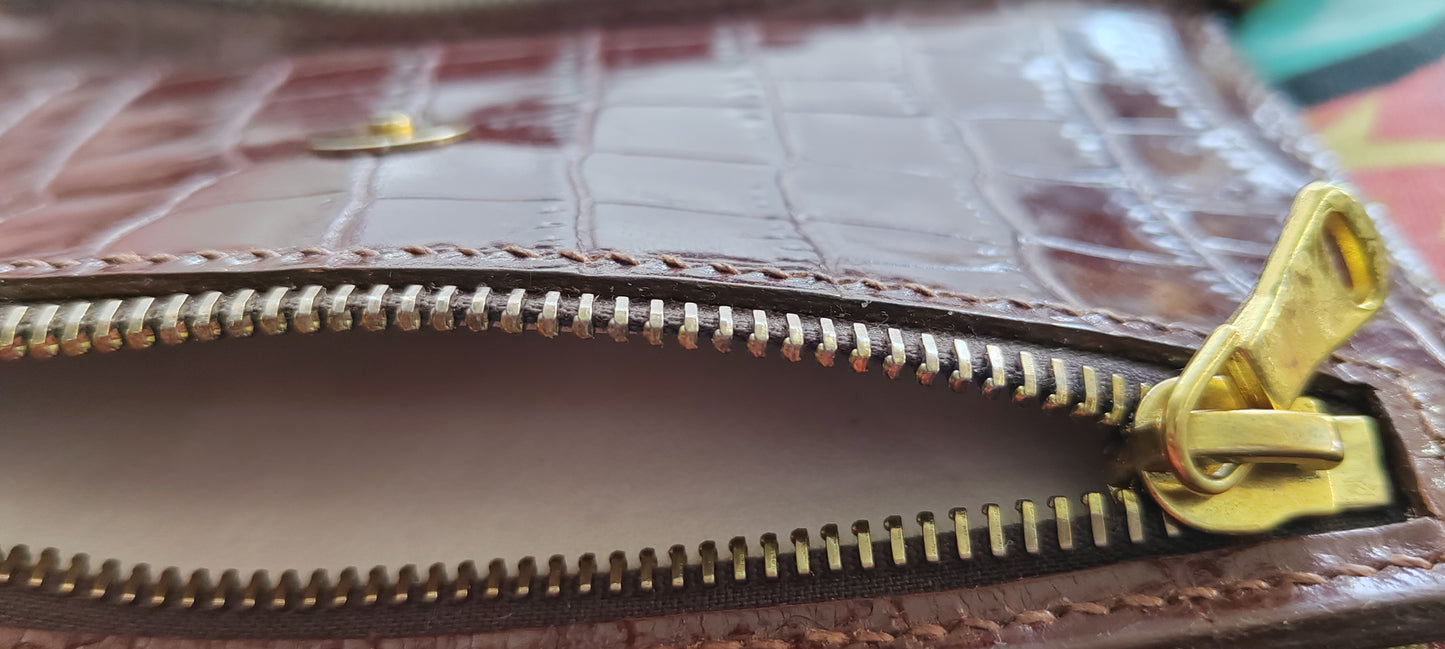 Le portefeuille cognac en cuir imprimé crocodile