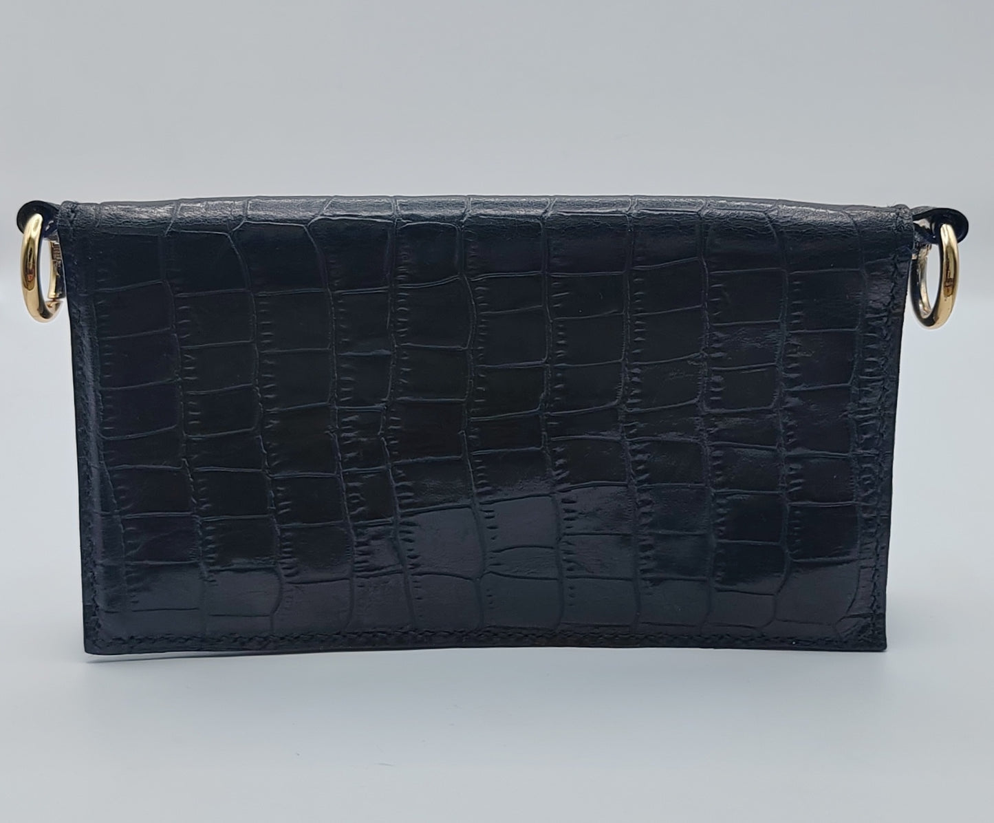 Le portefeuille noir en cuir imprimé crocodile