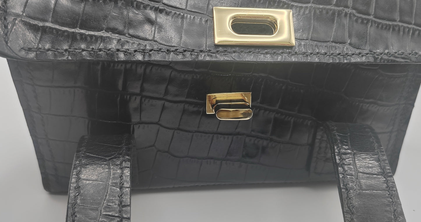 Le sac à main en cuir imprimé crocodile