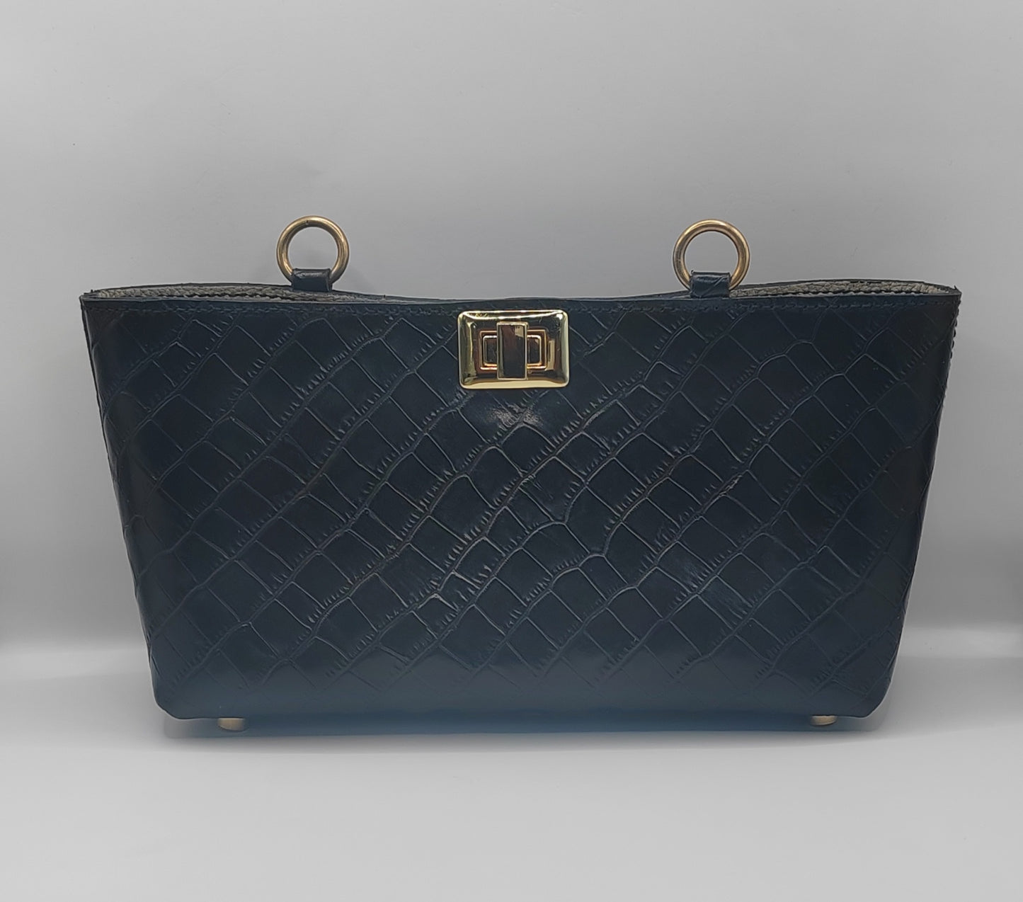 Le sac de soirée en cuir imprimé crocodile