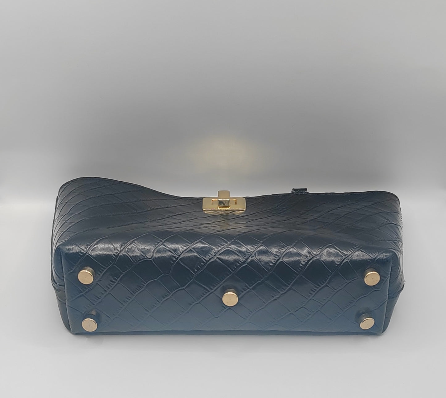 Le sac de soirée en cuir imprimé crocodile