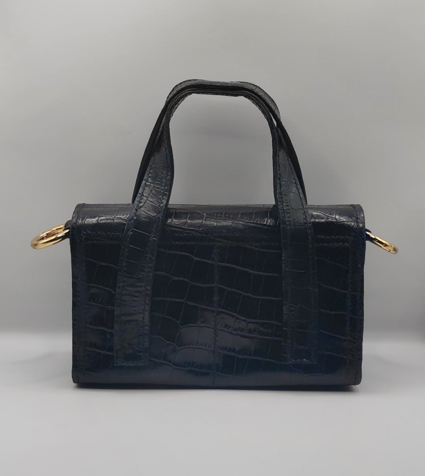 Le sac à main en cuir imprimé crocodile