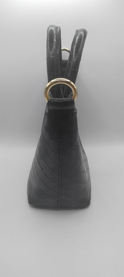 Le sac seau en cuir imprimé crocodile