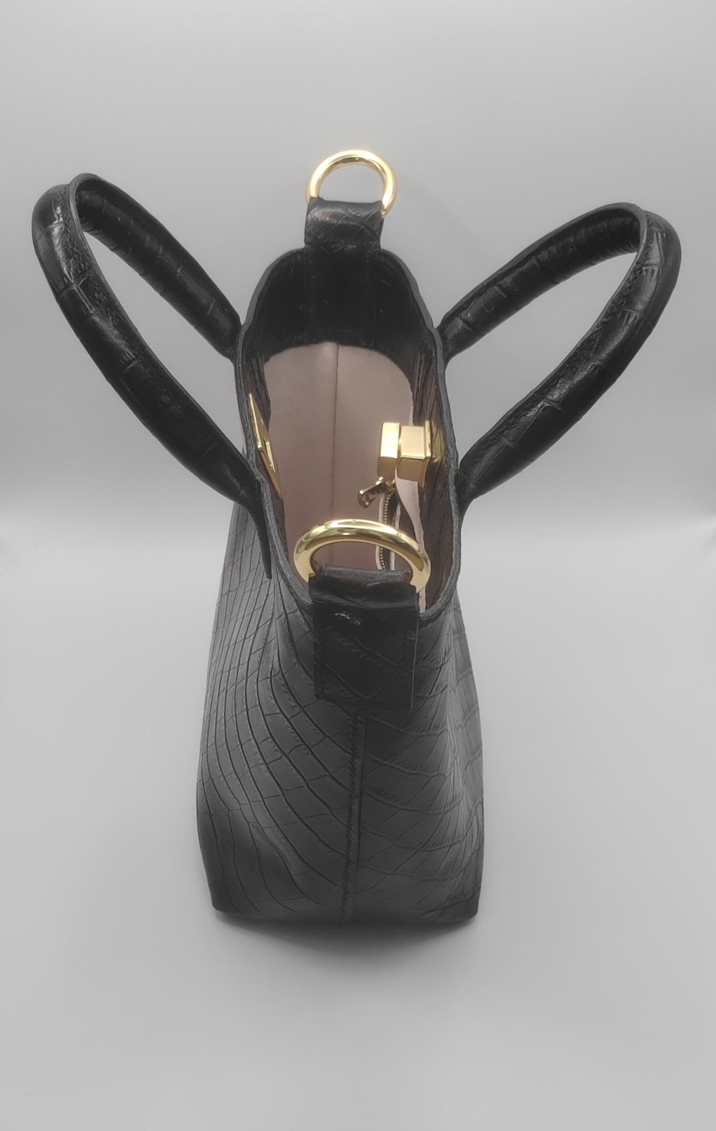 Le sac seau en cuir imprimé crocodile
