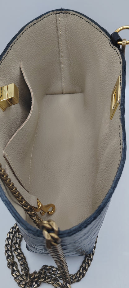 Le sac de soirée en cuir imprimé crocodile