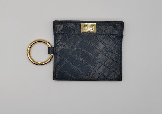 Le porte-cartes noir en cuir imprimé crocodile