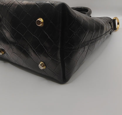 Le sac seau en cuir imprimé crocodile