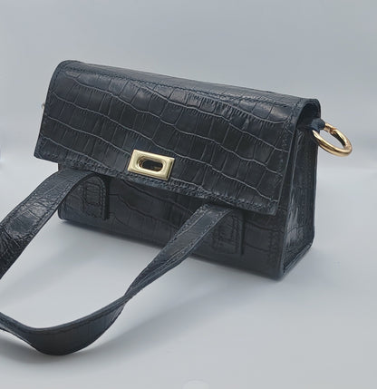 Le sac à main en cuir imprimé crocodile