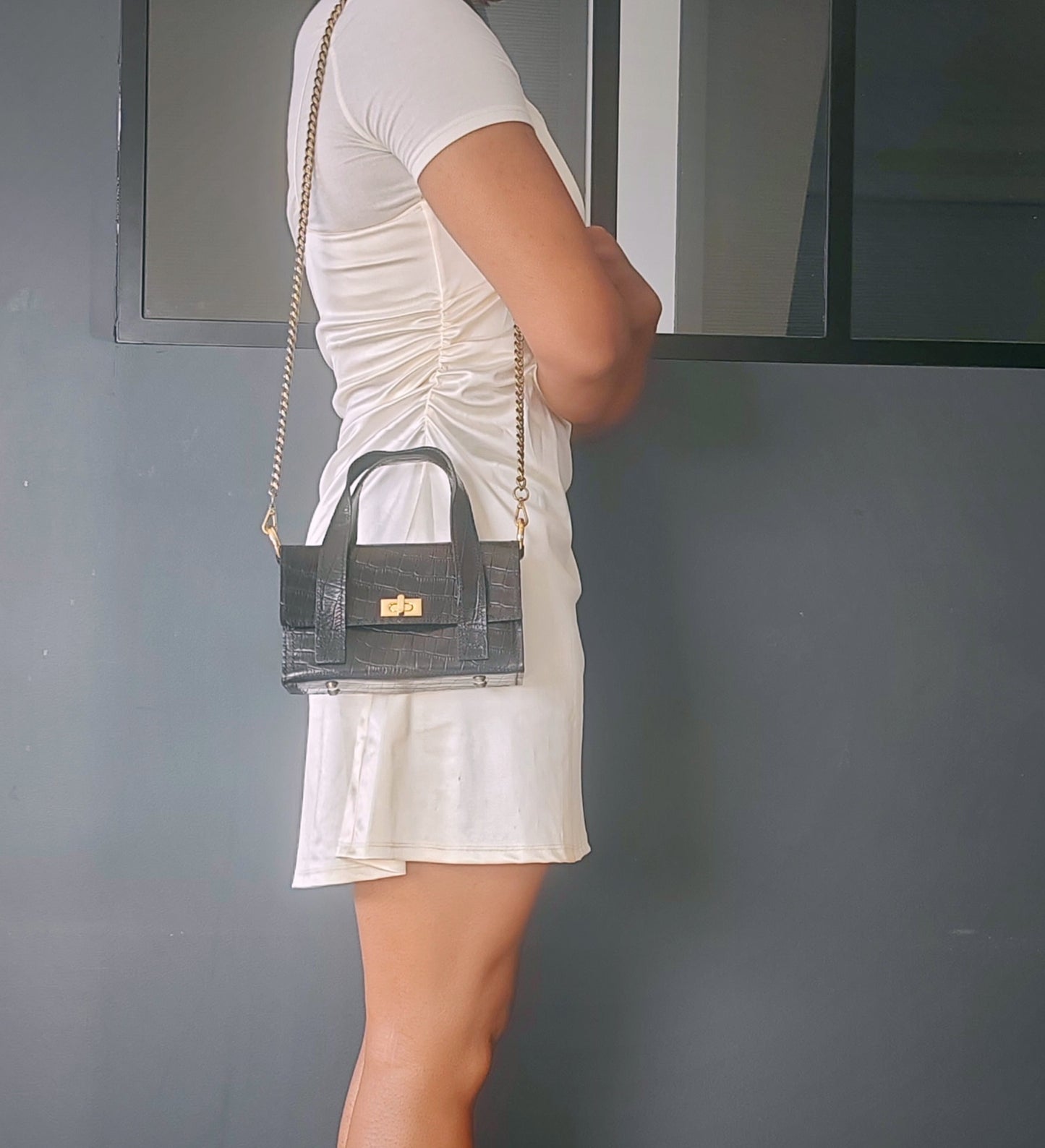 Le sac à main en cuir imprimé crocodile