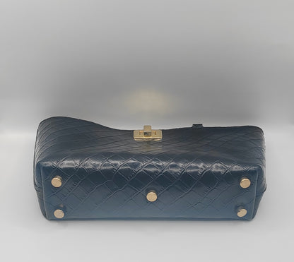 Le sac de soirée en cuir imprimé crocodile