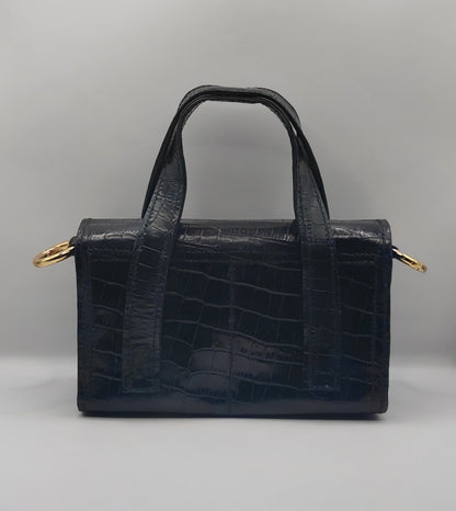 Le sac à main en cuir imprimé crocodile