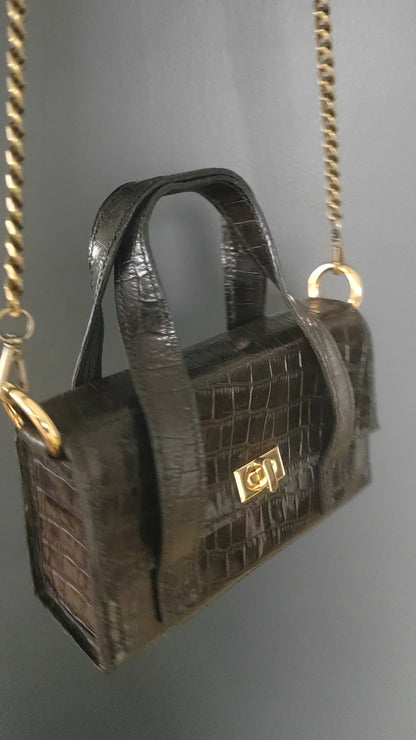 Le sac à main en cuir imprimé crocodile